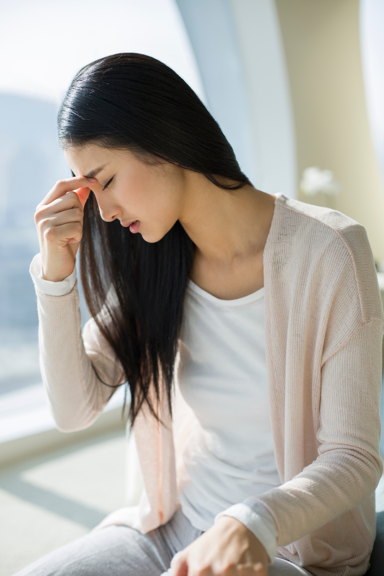 Young woman with headache