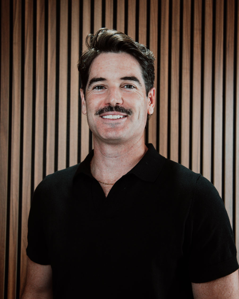 Professional portrait of Dr. Ben, a functional medicine physician specializing in personalized healthcare, preventive medicine, and longevity.