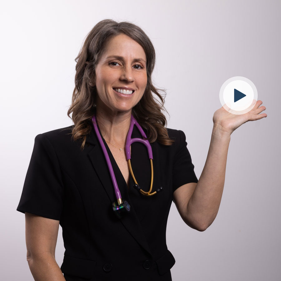 Female healthcare professional holding a play button